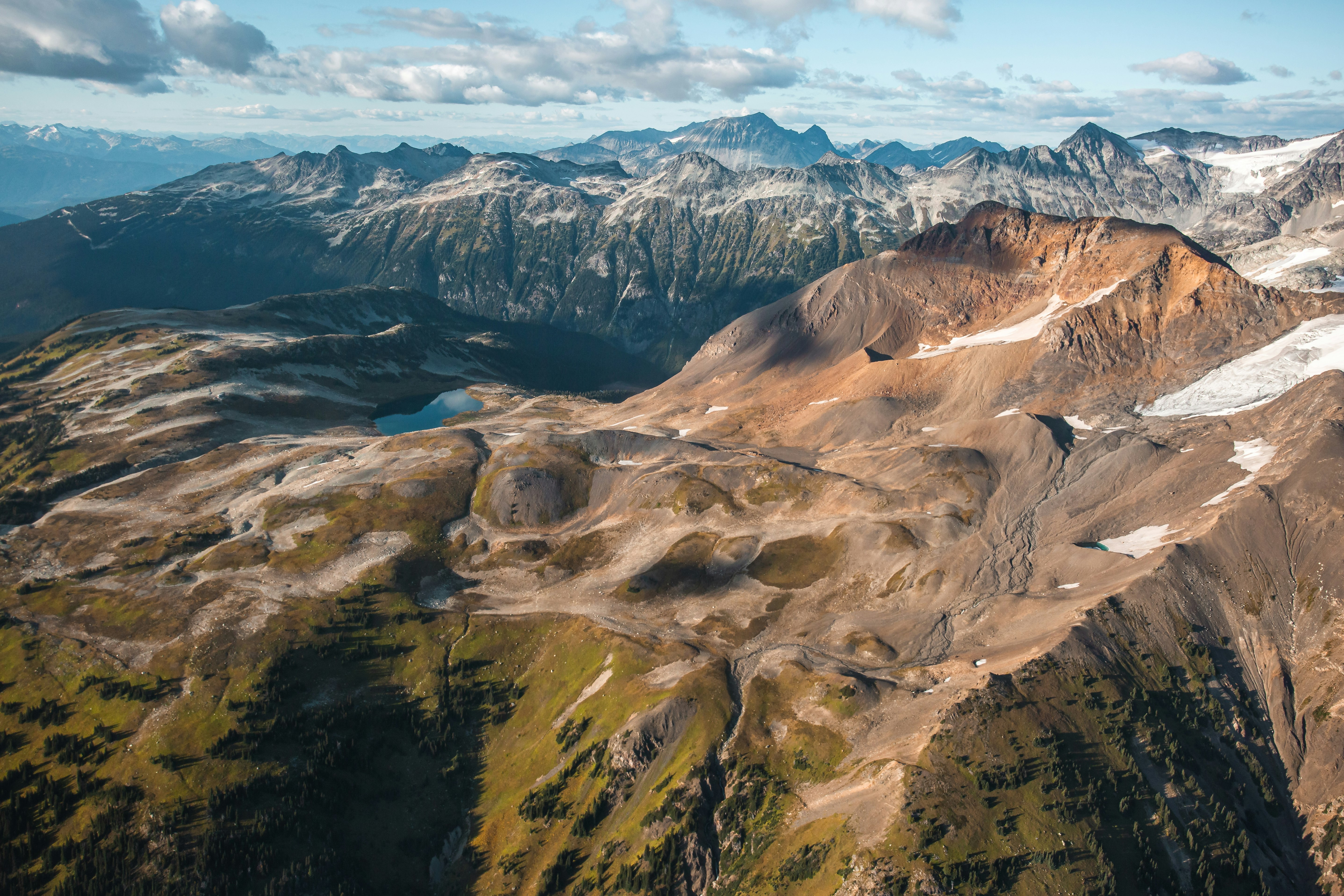 brown and gray mountains under blue sky during daytime